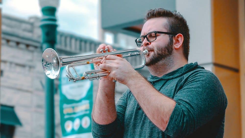 Man playing standard trumpet