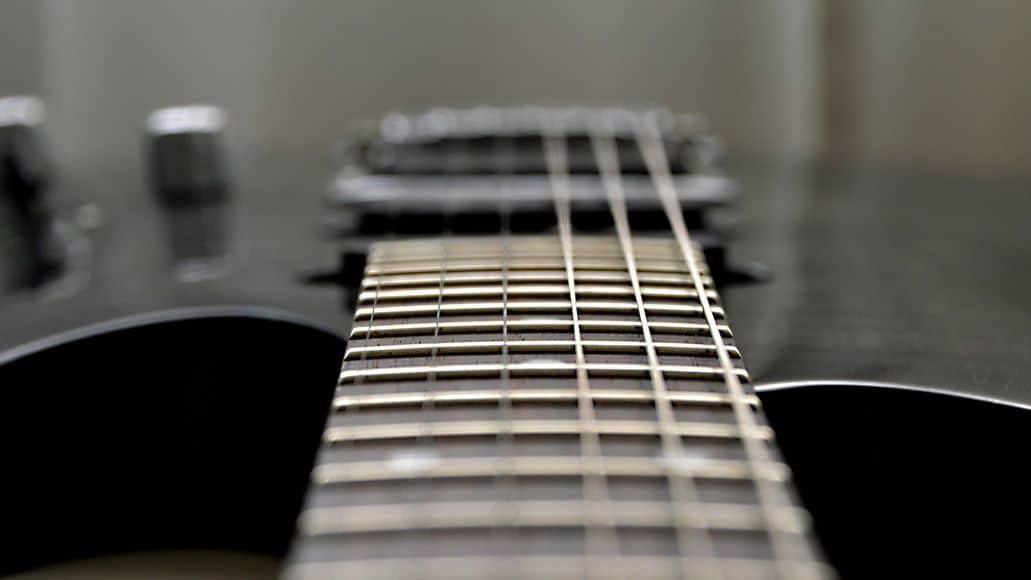 Closeup of strings on electric guitar