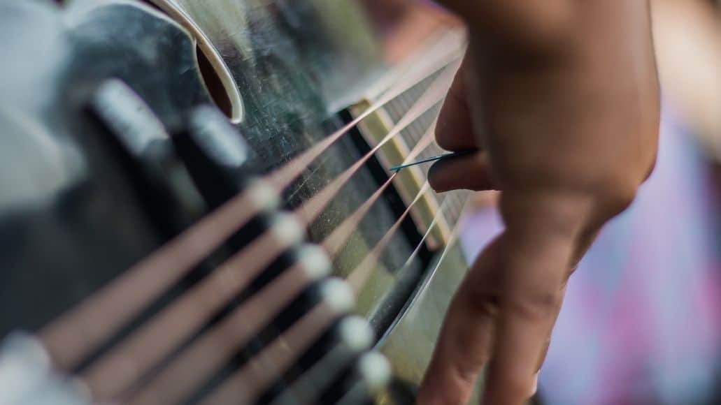 playing a chord on baritone guitar