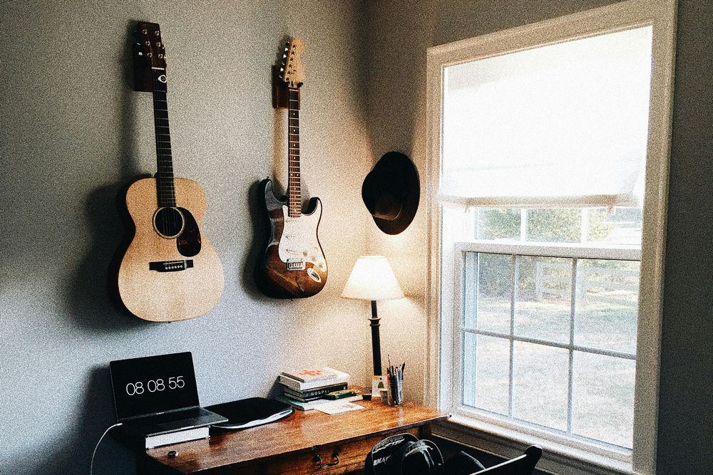 guitars hanging on wall